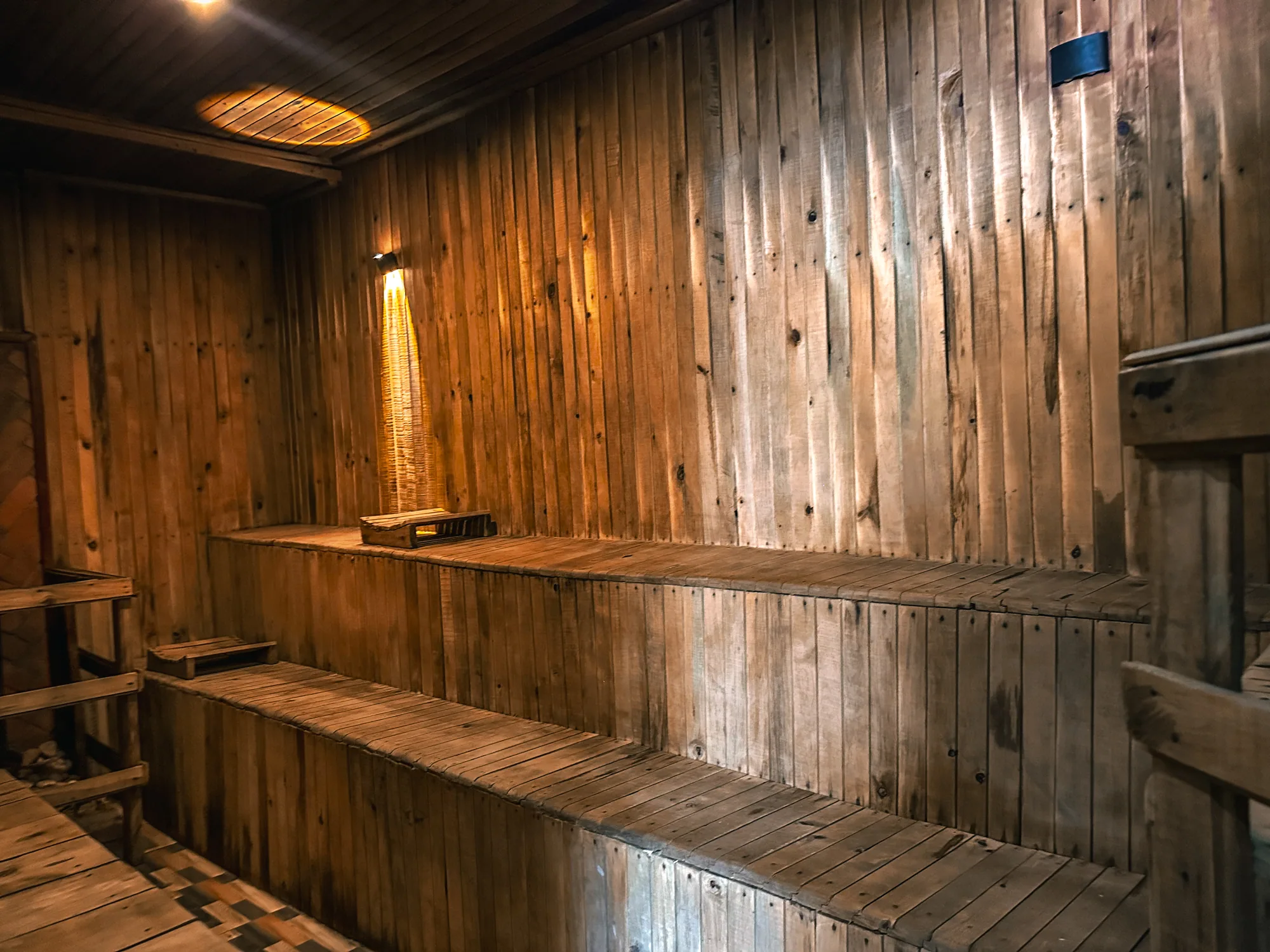 The sauna interior looking along its slatted timber benches